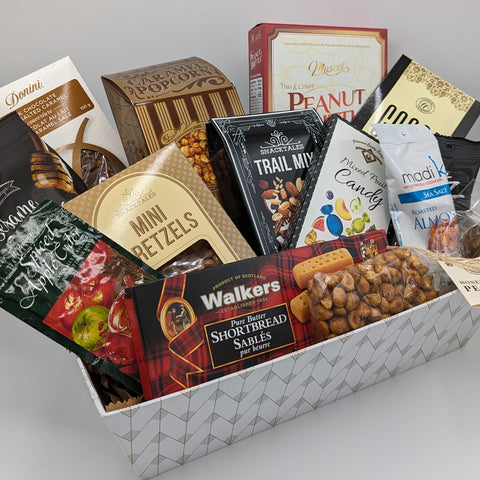 Shareable Basket filled with all kinds of treats including popcorn, gourmet chocolate, cookies, and more!