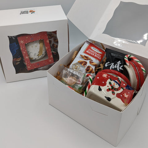Holiday Sweets Boxes, one with a festive jar and the other with an ornament.