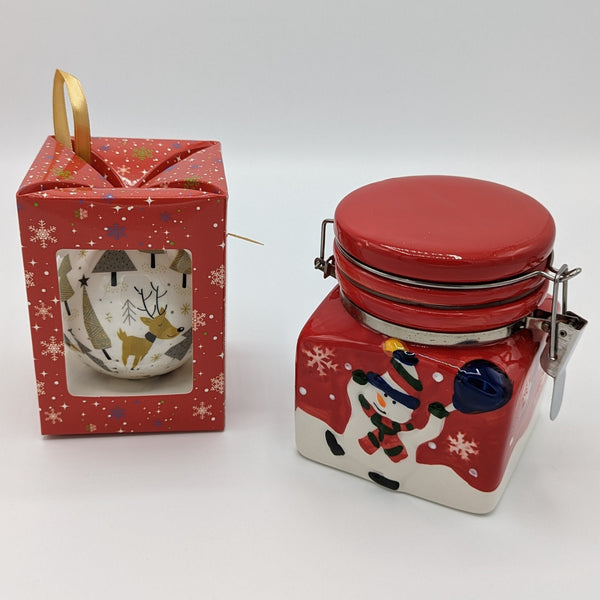 Cute deer ornament and ceramic snowman jar.