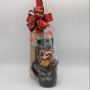 Festive mug gift with Donini chocolate, hot drink blend, and assorted treats.