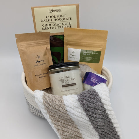 Calm basket featuring soothing Thrive bath products, an F&L candle, and more.